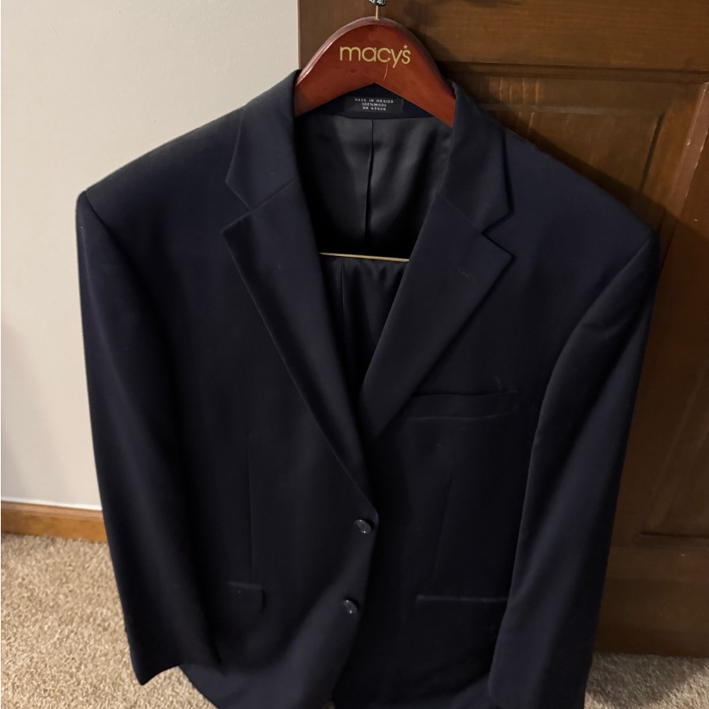 Jones of New York men’s navy suit
Size 42r
Pants 32
